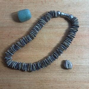 Mixed metal spiral necklace